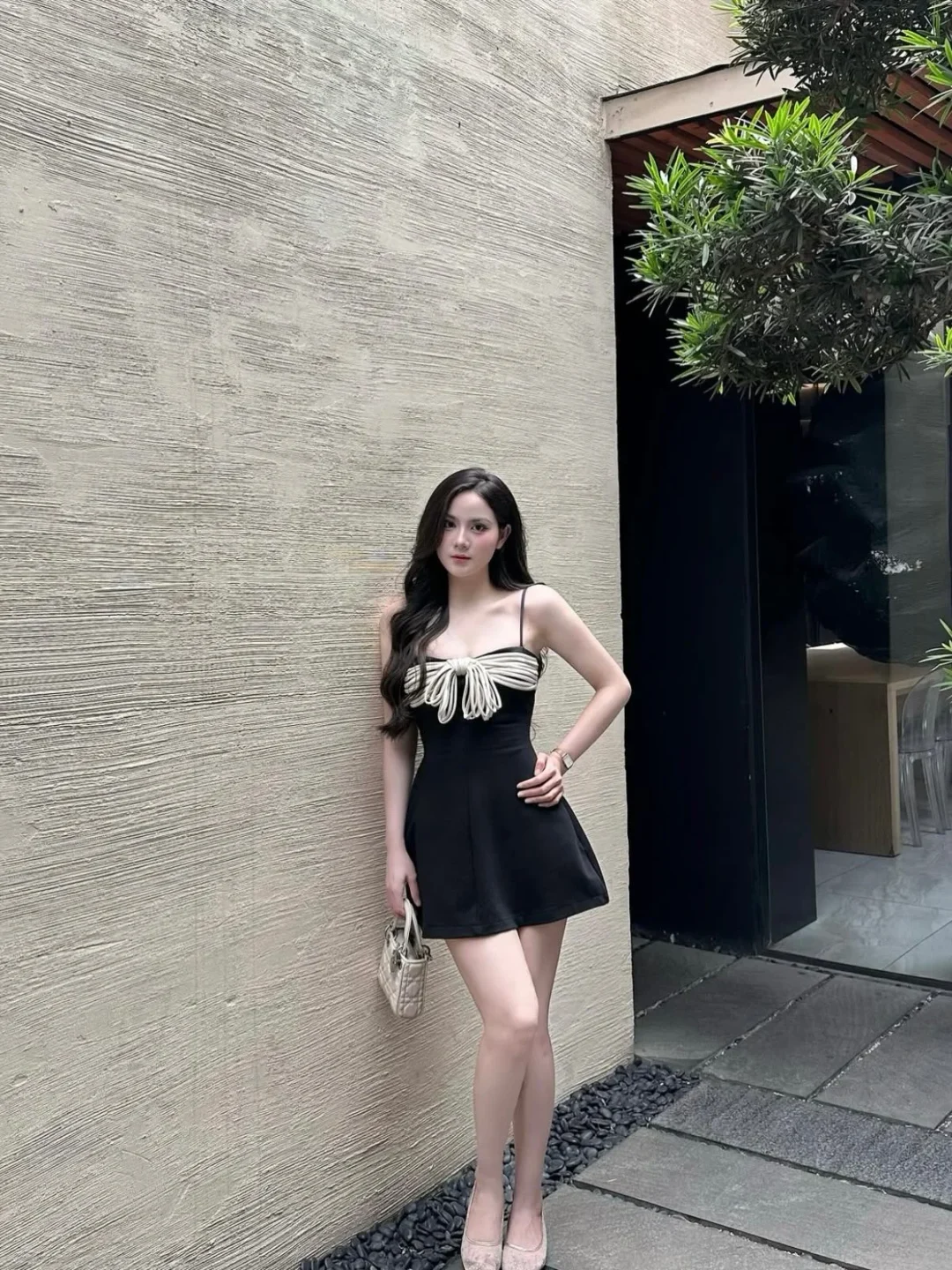 Photo 2 of Váy ngắn đen nơ trắng Aguja Studio
