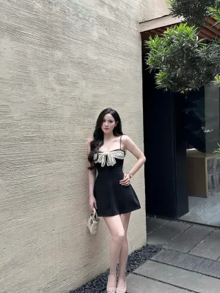 Photo 2 of Váy ngắn đen nơ trắng Aguja Studio