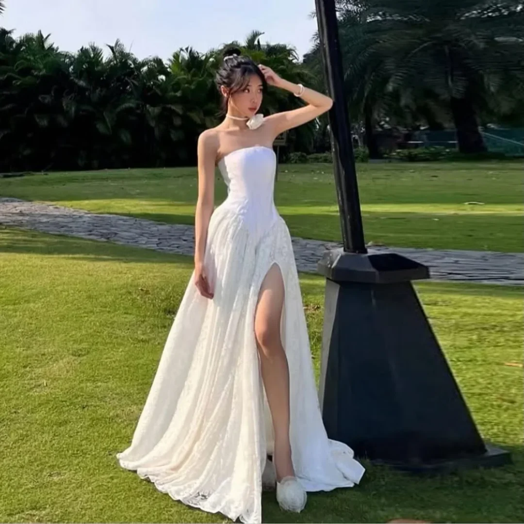 Photo 4 of Váy cưới trắng xòe ren không dây nữ