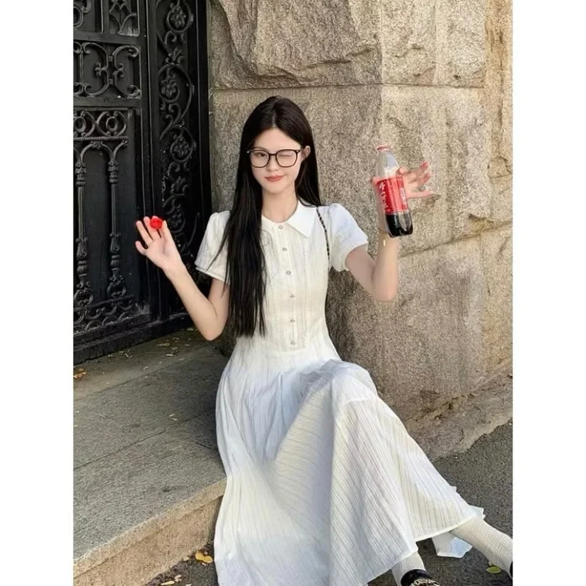 Photo 1 of Váy maxi trắng xếp nếp nữ tính