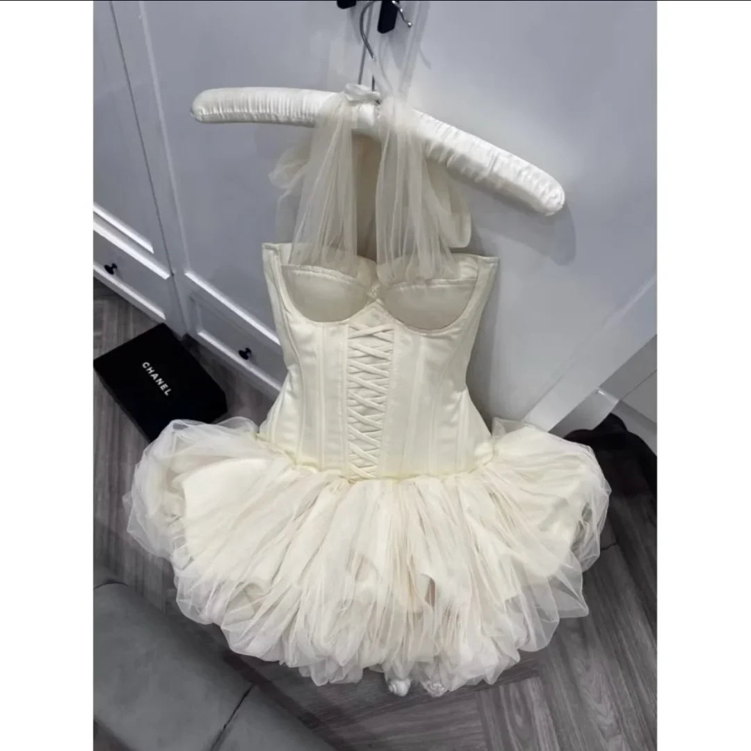 Photo 1 of Váy corset tutu trắng kem size M