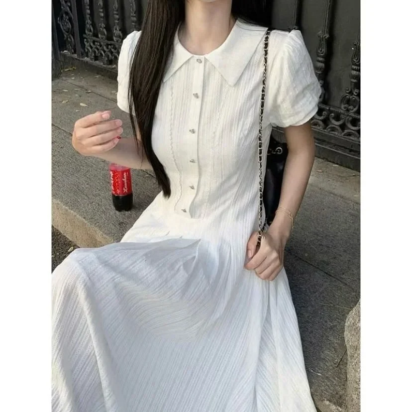 Photo 3 of Váy maxi trắng xếp nếp nữ tính