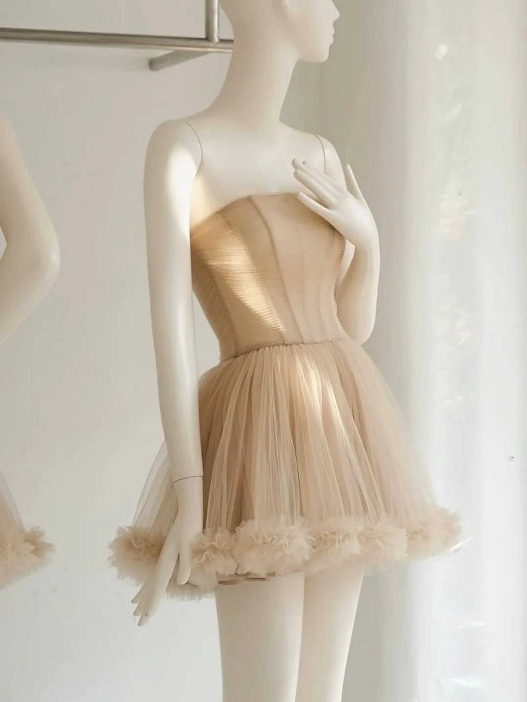 Photo 6 of Váy tulle mini không dây màu nude Chou Chou