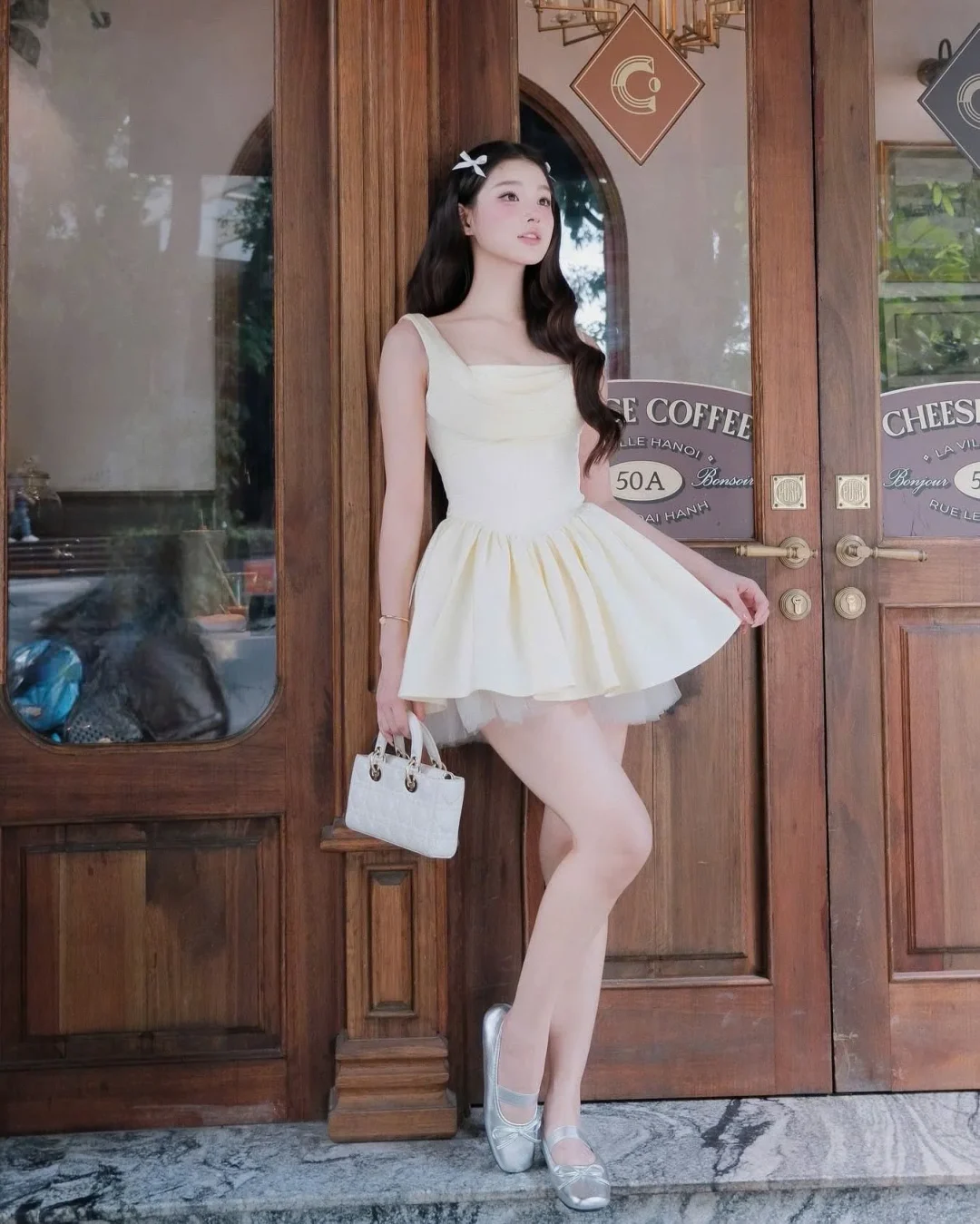Photo 2 of Đầm mini xếp ly vàng nhạt Jubin Studio