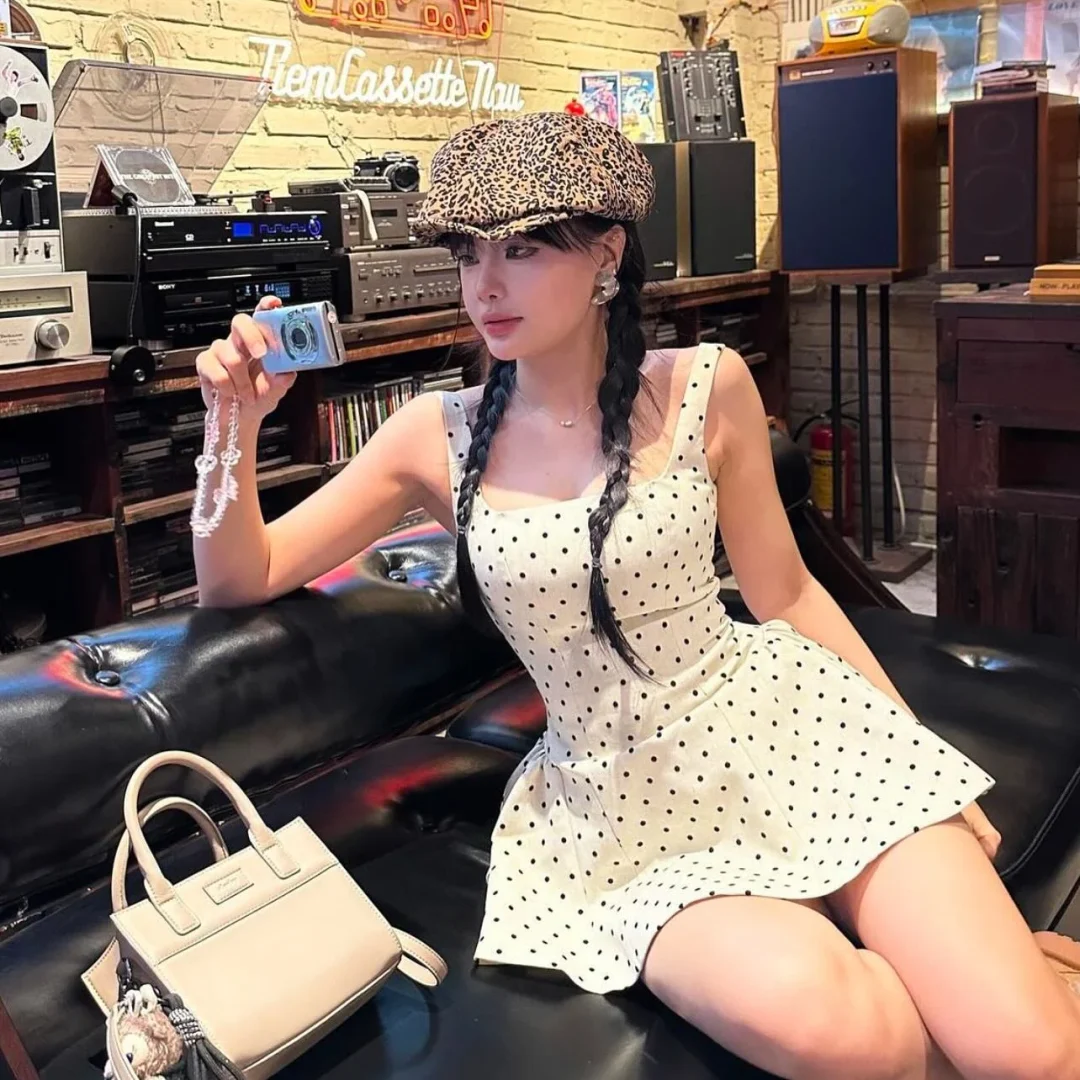 Photo 2 of Váy chấm bi ngắn kem Lsoul size M