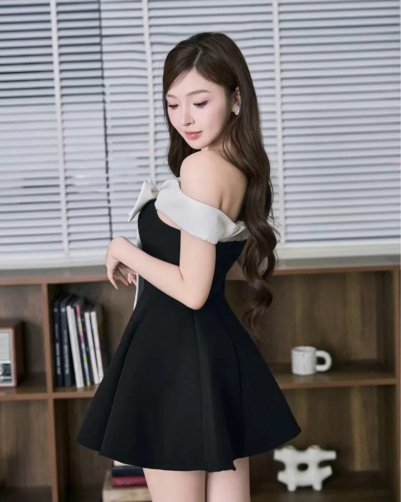 Photo 3 of Váy mini trễ vai nơ trắng nữ