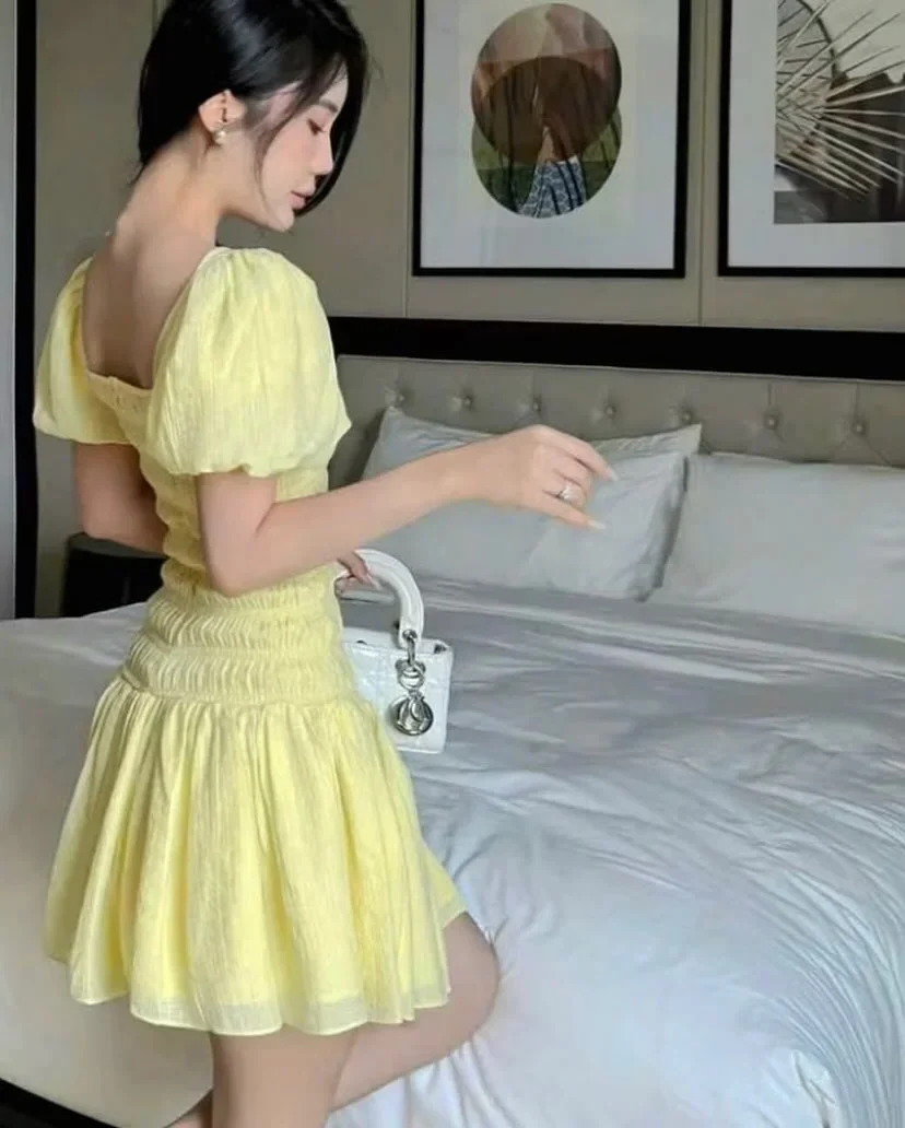 Ảnh 4 của Váy babydoll vàng nhạt tay phồng nữ