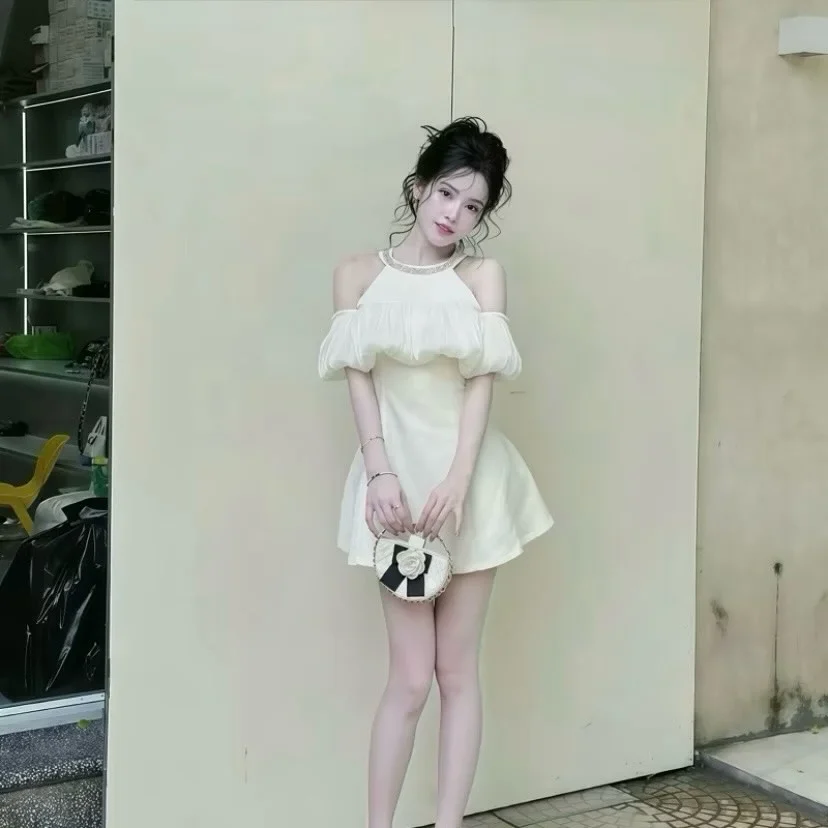 Photo 4 of Đầm ngắn trễ vai kem nữ tính