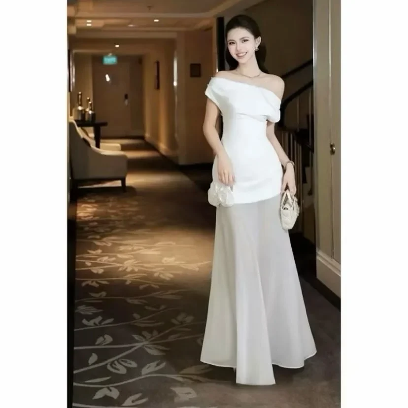 Photo 3 of Đầm trắng trễ vai hoa nổi nữ