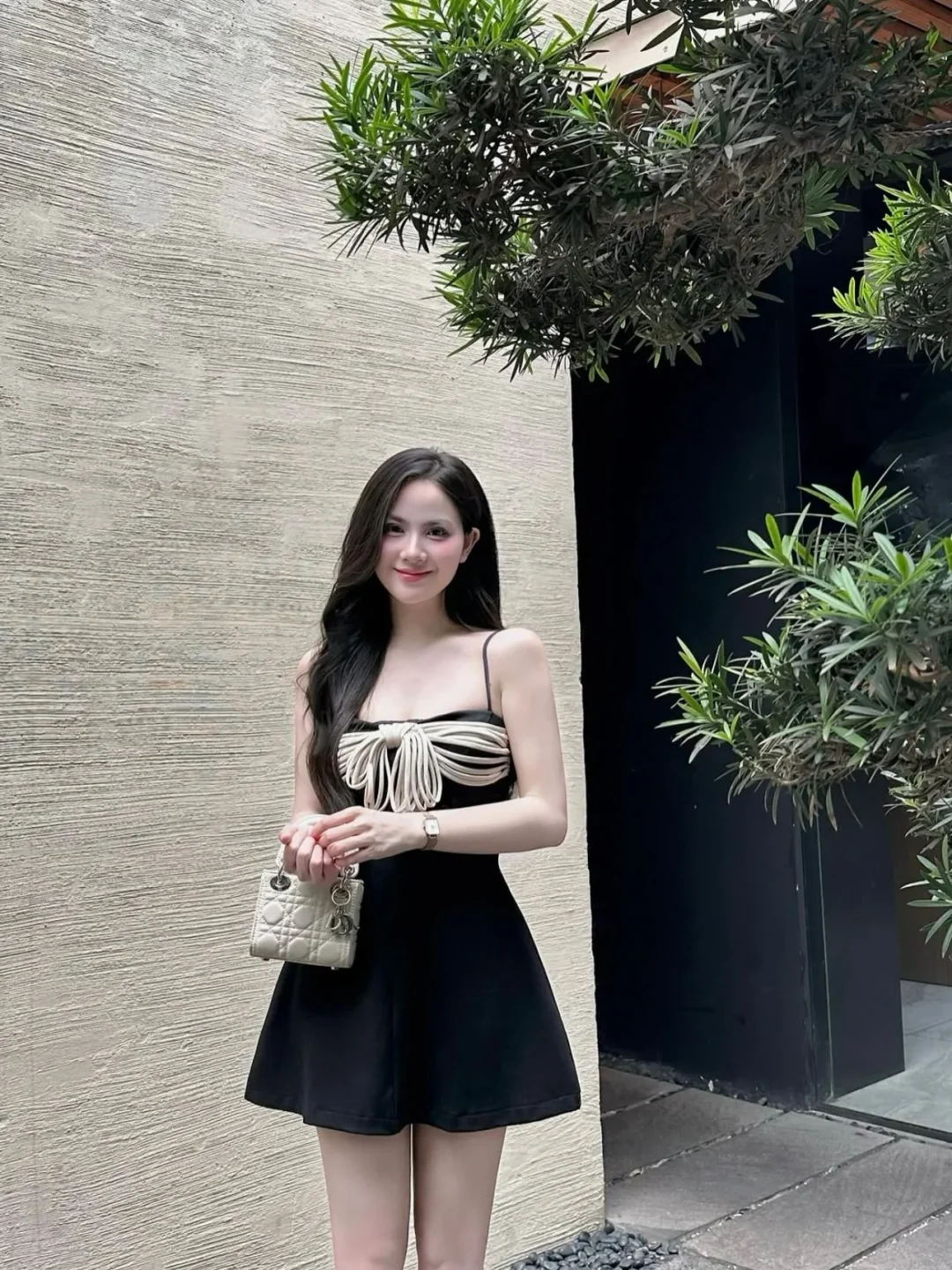 Photo 6 of Váy ngắn đen nơ trắng Aguja Studio