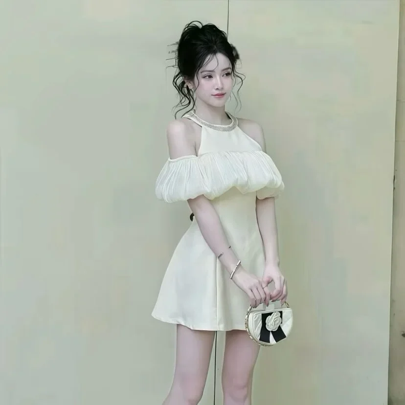 Photo 1 of Đầm ngắn trễ vai kem nữ tính