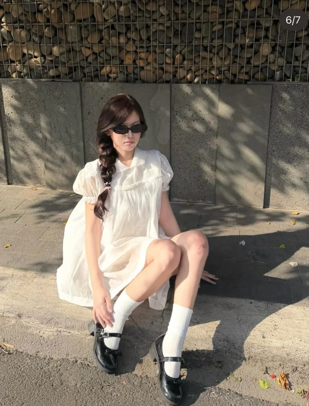 Photo 2 of Váy babydoll trắng ngắn tay phồng nữ