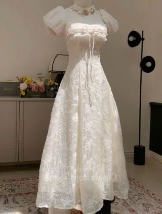 Photo 1 of Váy ren trắng tay phồng nữ