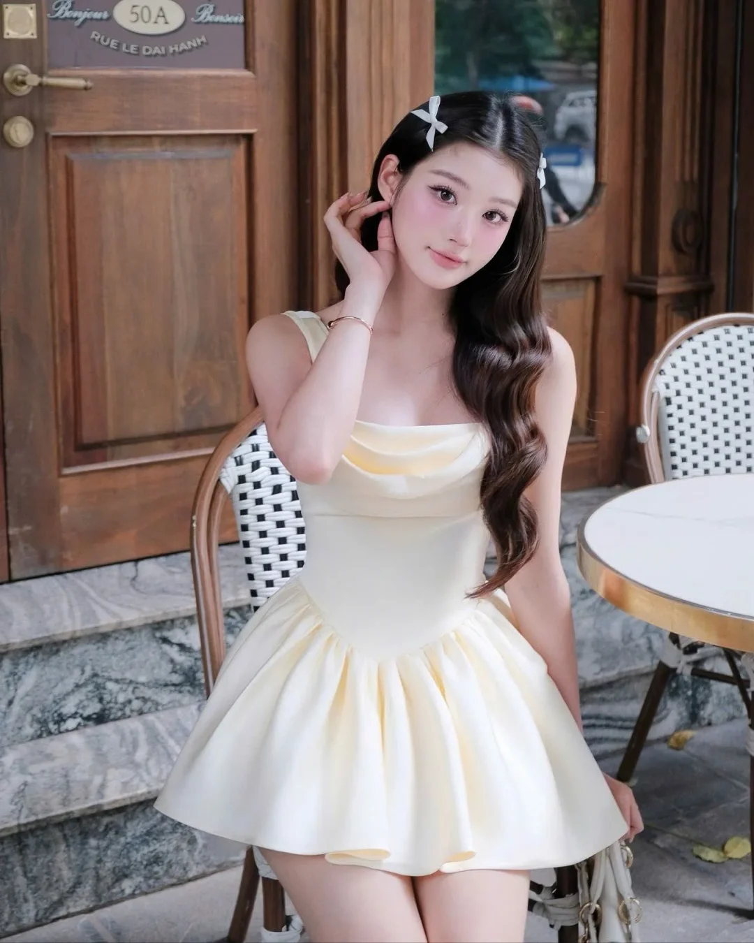 Photo 1 of Đầm mini xếp ly vàng nhạt Jubin Studio
