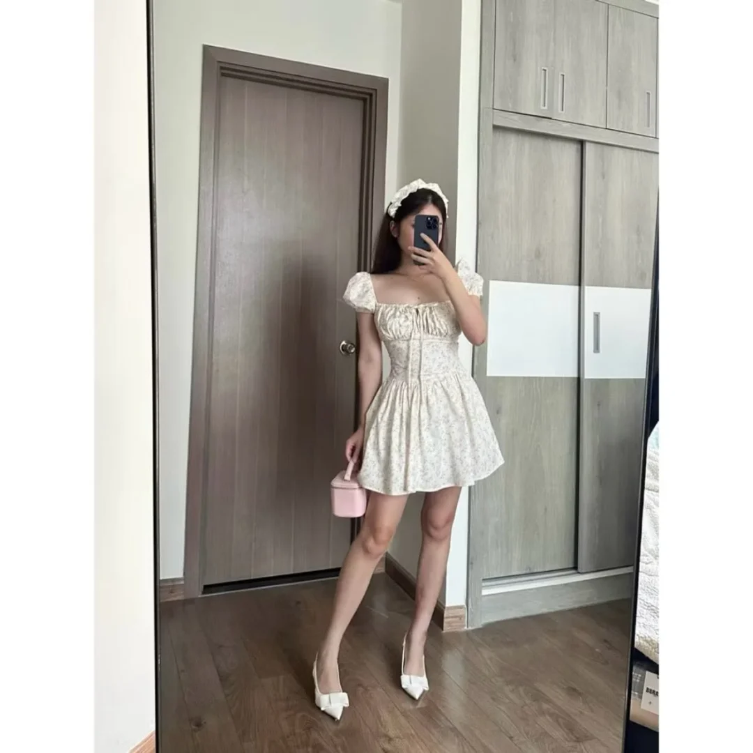 Photo 2 of Váy hoa mini be hồng tay phồng