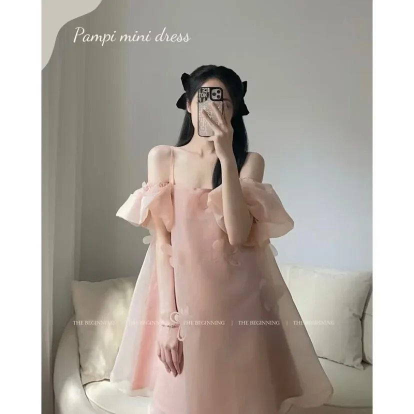 Photo 1 of Váy mini vai trễ hồng pastel nữ tính