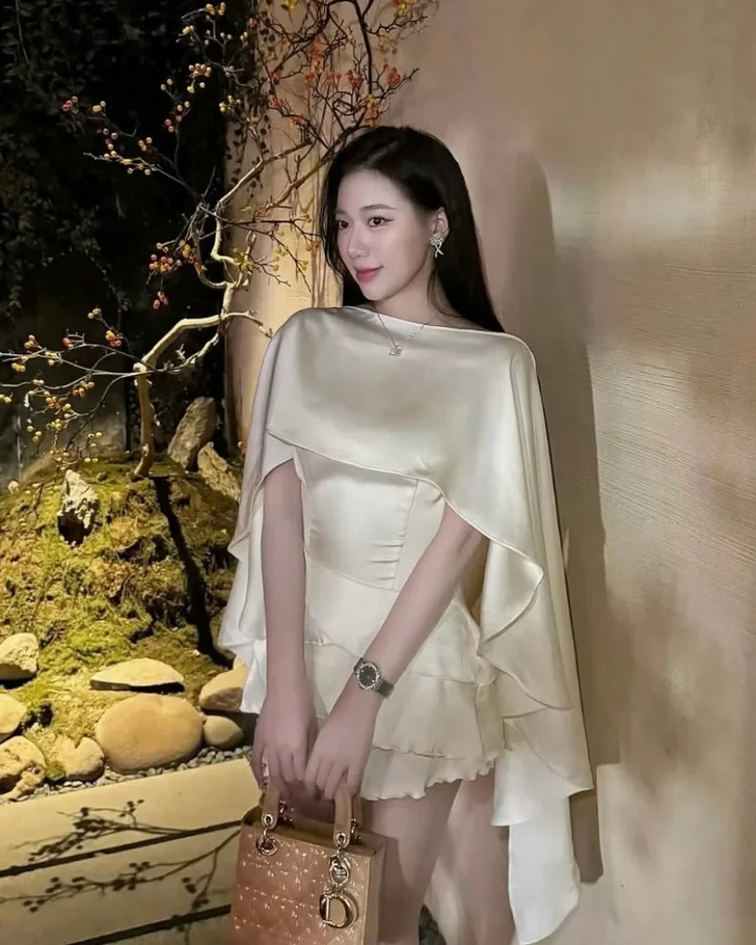 Photo 4 of Đầm mini lụa kem choàng vai nữ