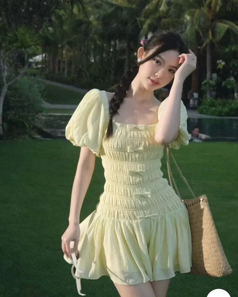 Ảnh 1 của Váy babydoll vàng nhạt tay phồng nữ