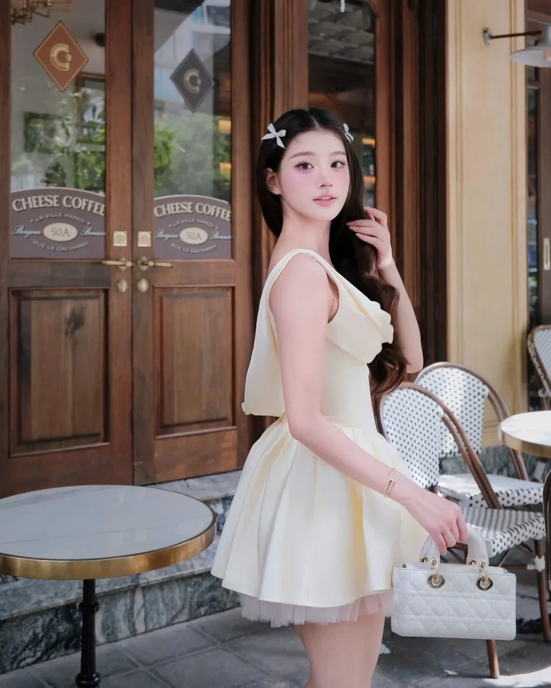 Photo 4 of Đầm mini xếp ly vàng nhạt Jubin Studio