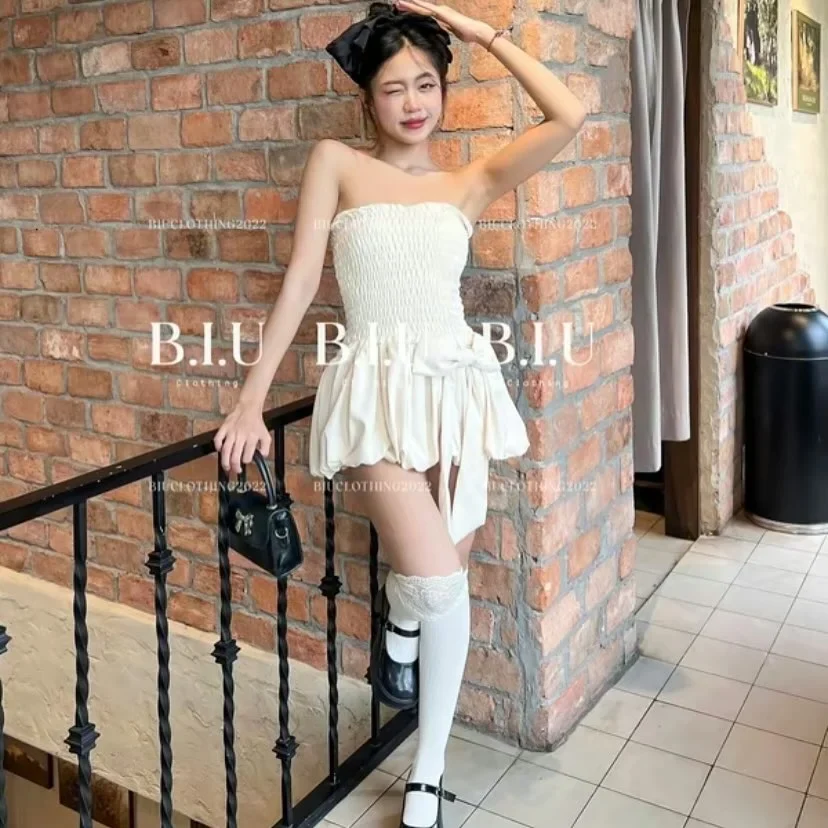 Ảnh 3 của Set áo quây chân váy nơ kem nữ