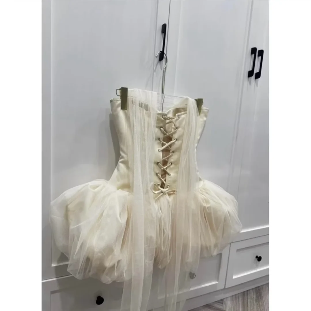 Photo 2 of Váy corset tutu trắng kem size M