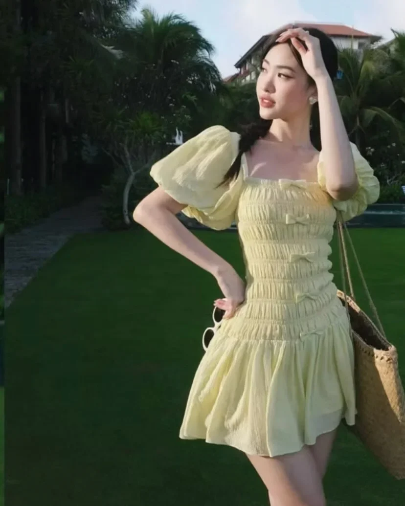 Ảnh 2 của Váy babydoll vàng nhạt tay phồng nữ