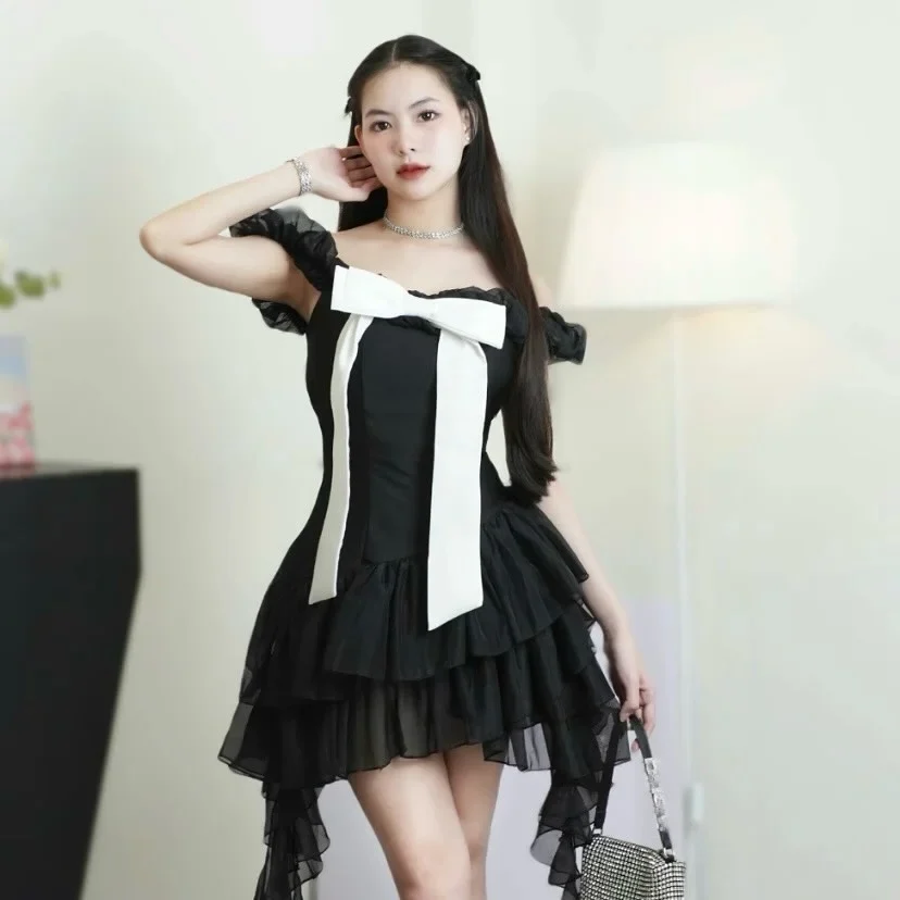 Ảnh 2 của Đầm trễ vai đen nơ trắng nữ tính
