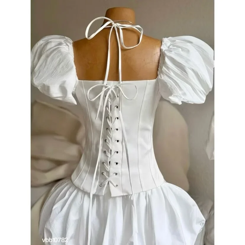 Ảnh 4 của Đầm mini trắng corset tay phồng nữ