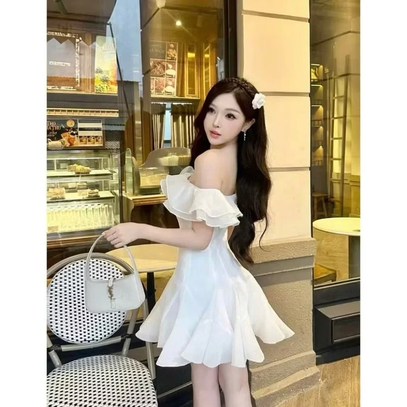 Photo 2 of Váy trắng trễ vai bèo nhún nữ tính