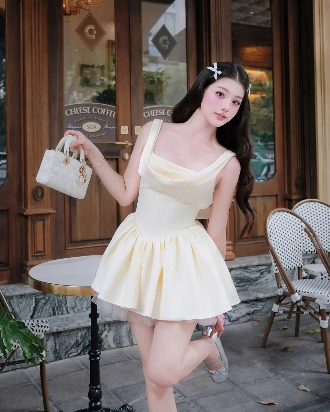 Photo 3 of Đầm mini xếp ly vàng nhạt Jubin Studio