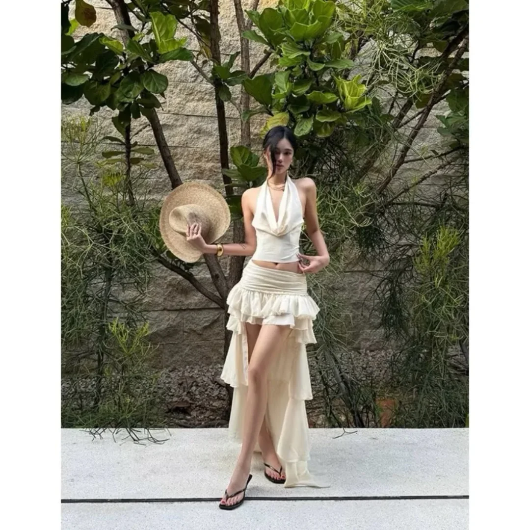 Photo 4 of Set áo yếm chân váy bèo nhún trắng kem