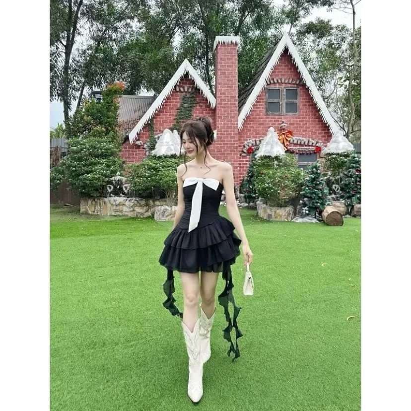 Photo 2 of Đầm đen cột nơ trắng nữ dự tiệc