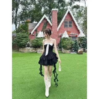 Photo 2 of Đầm đen cột nơ trắng nữ dự tiệc