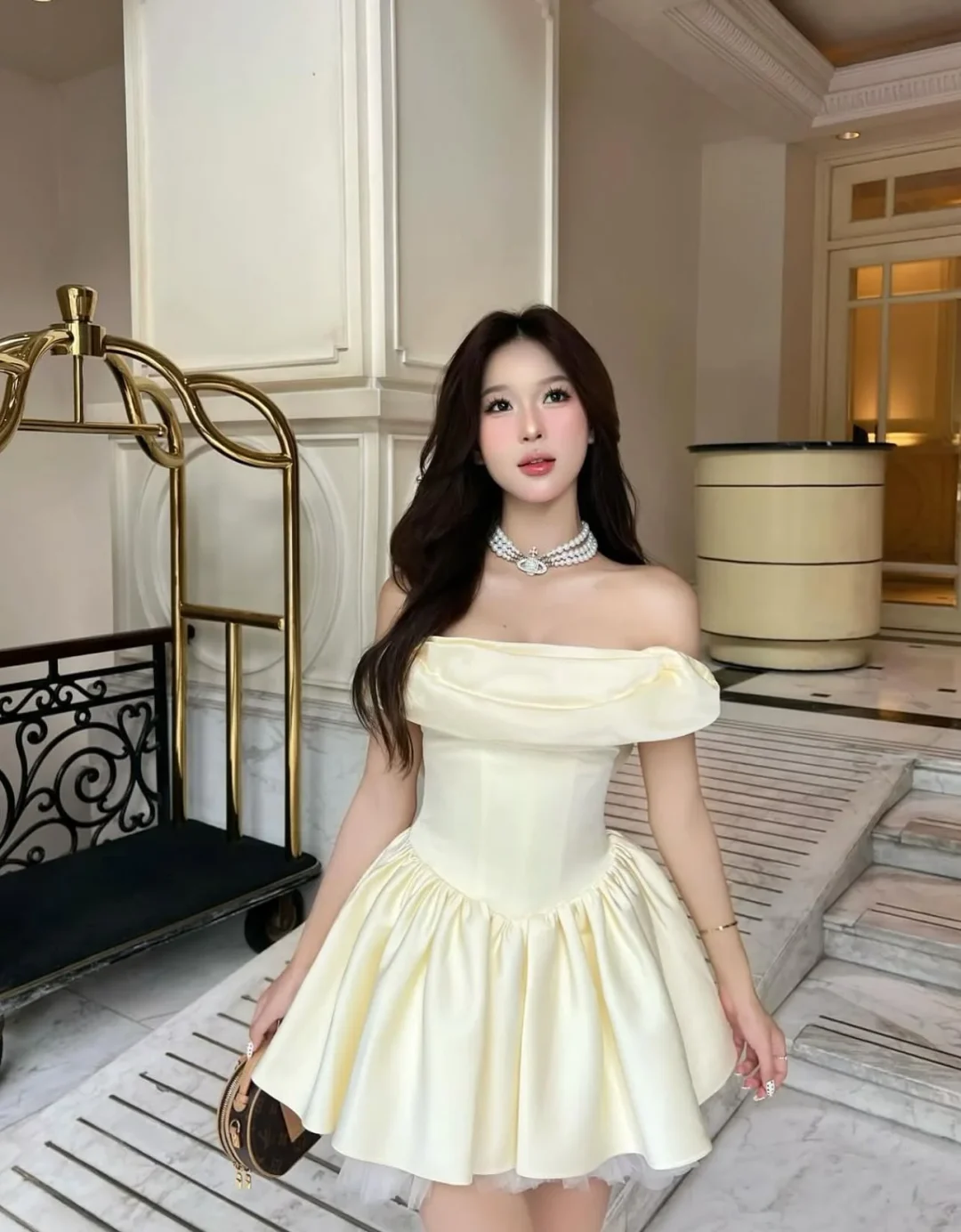 Photo 3 of Váy satin trễ vai vàng nhạt Jubin Studio