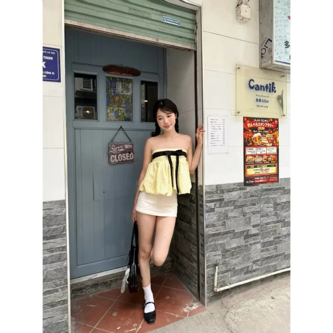 Photo 2 of Áo quây chấm bi vàng freesize nữ