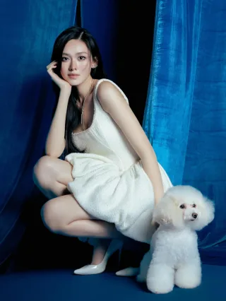 Ảnh 4 của Đầm mini trắng xù Huong Boutique