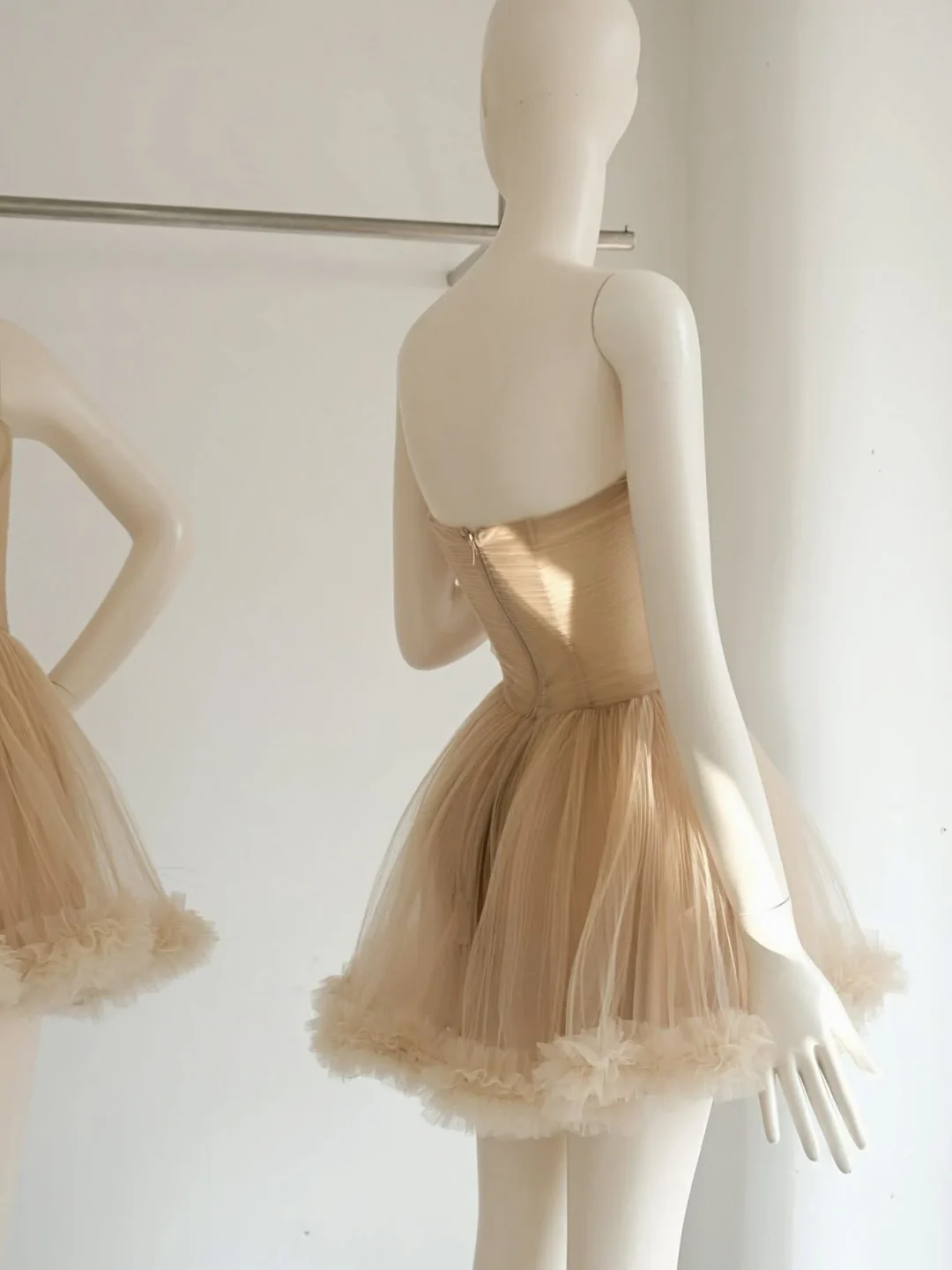 Photo 8 of Váy tulle mini không dây màu nude Chou Chou