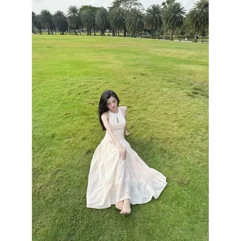 Ảnh 3 của Váy maxi lụa kem halter nữ