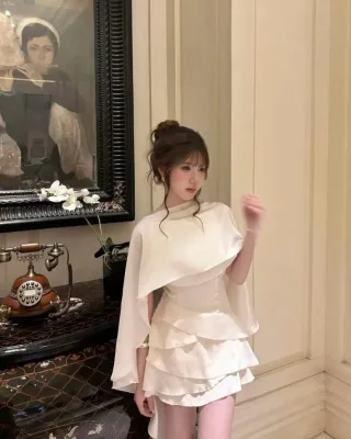 Photo 1 of Đầm mini lụa kem choàng vai nữ