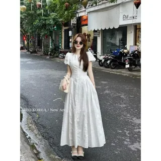 Photo 1 of Váy maxi trắng tay phồng nữ tính