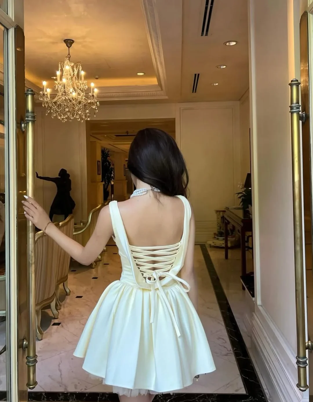 Photo 6 of Váy satin trễ vai vàng nhạt Jubin Studio