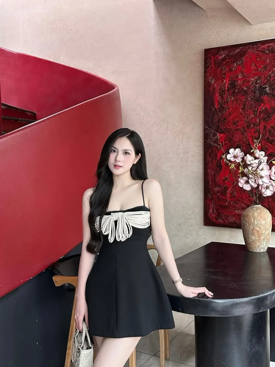 Photo 4 of Váy ngắn đen nơ trắng Aguja Studio