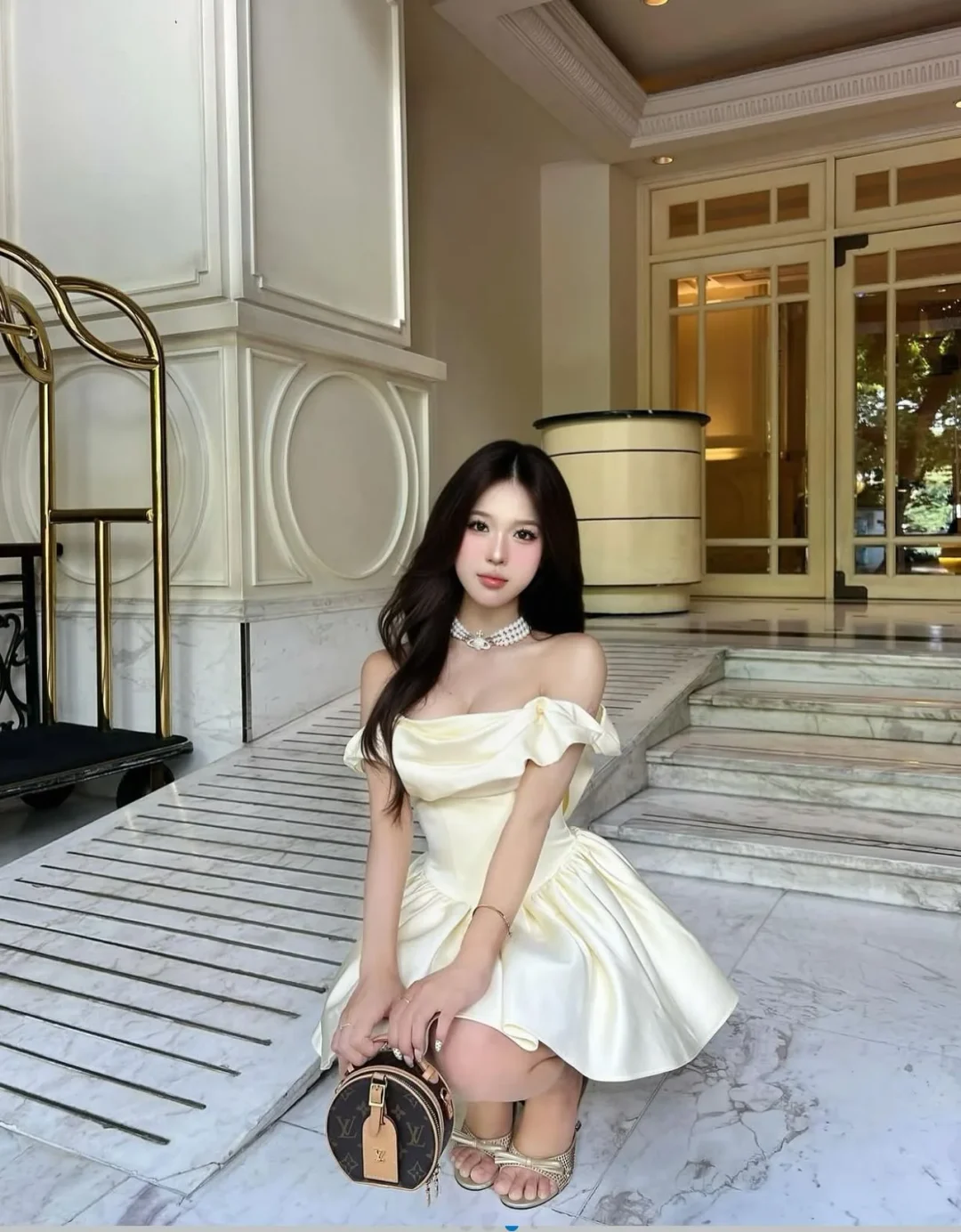 Photo 5 of Váy satin trễ vai vàng nhạt Jubin Studio