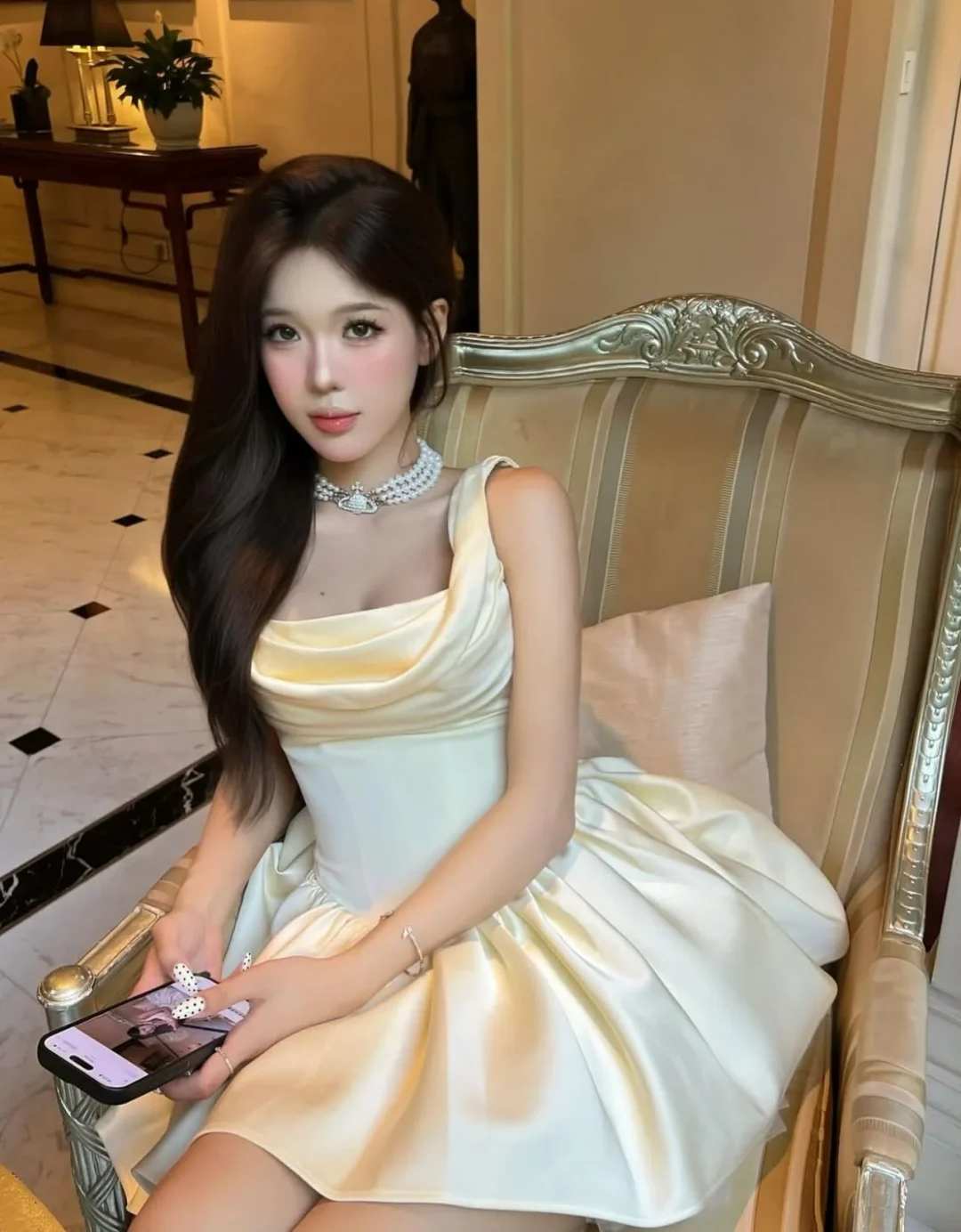 Photo 4 of Váy satin trễ vai vàng nhạt Jubin Studio