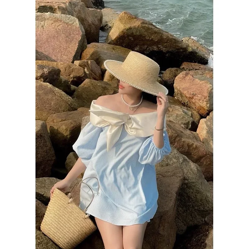 Photo 2 of Váy midi trễ vai sọc xanh nơ kem