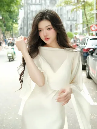 Photo 3 of Váy trắng choàng vai voan nữ tính