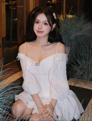 Photo 4 of Váy trắng trễ vai corset tay phồng