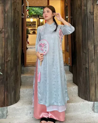 Photo 4 of Váy sườn xám lụa xanh nữ thanh lịch