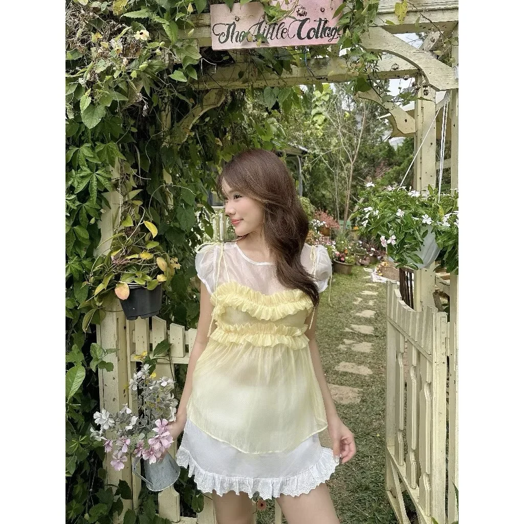Photo 6 of Set áo voan vàng và chân váy trắng nữ