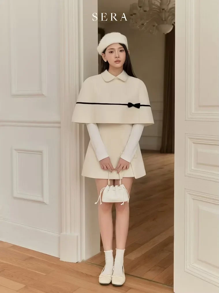 Ảnh 3 của Set áo cape váy ngắn trắng nữ